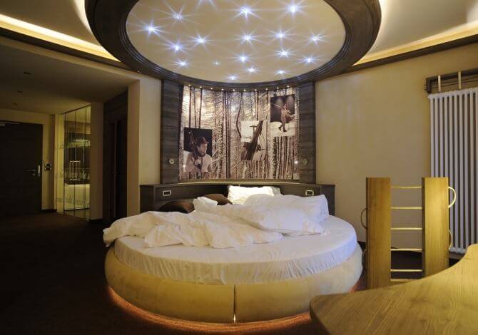 Circular bed with starry ceiling