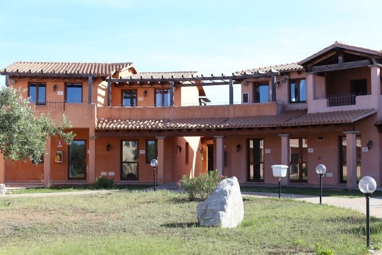 residence and stone placed in the middle of the garden