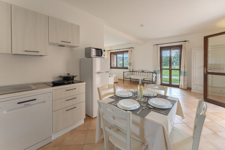 dining room with table and bottle of wine studio 4