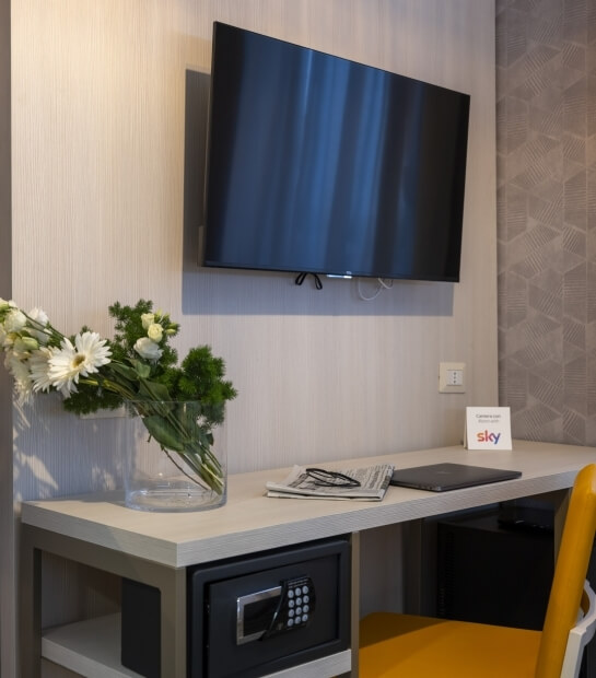 desk and wall-mounted TV