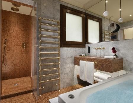 bathroom with whirlpool tub in the deluxe suite 