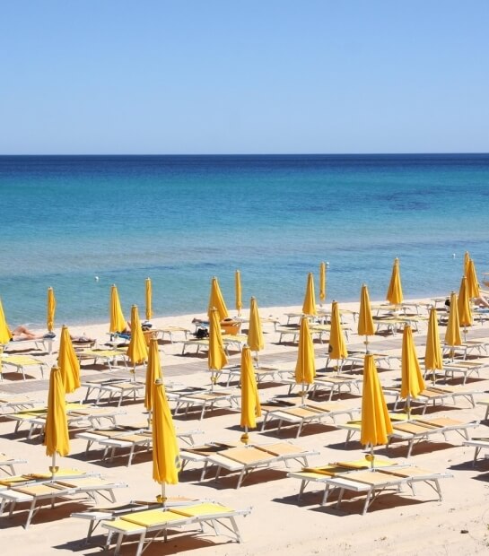 Costa Rei beach with umbrellas