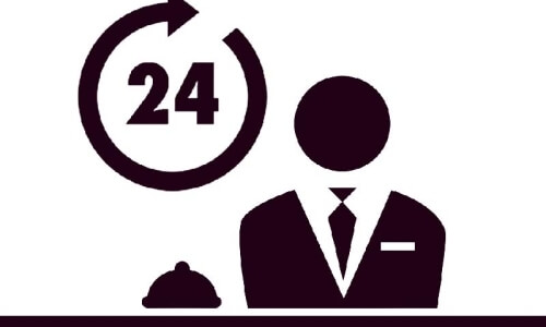 Circular logo with "24," serving tray cover, and man in burgundy suit, symbolizing 24/7 room service.