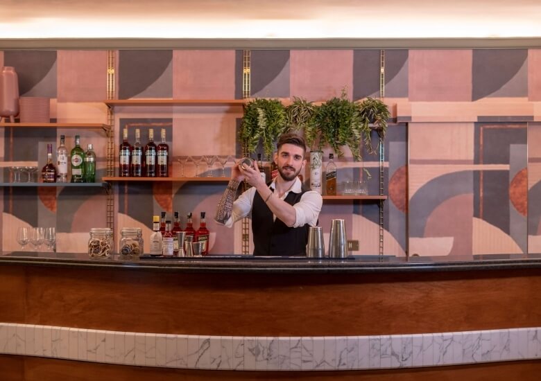 barman at the hotel milani bar rome 