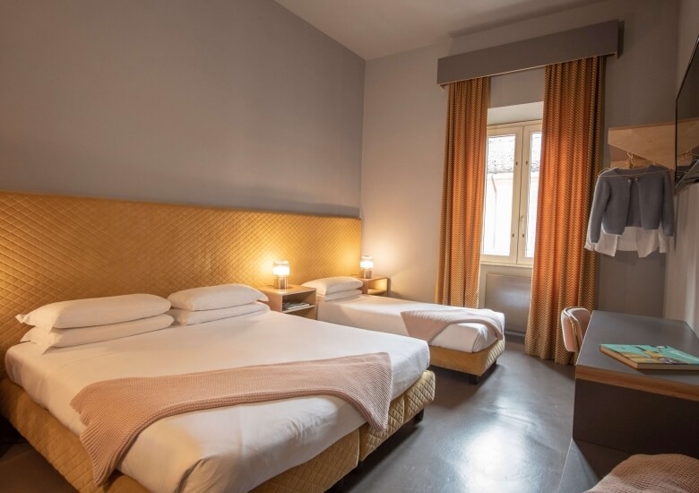 letto camera tripla hotel milani roma