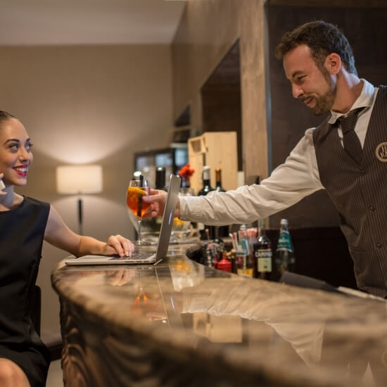 barman and customer at the counter