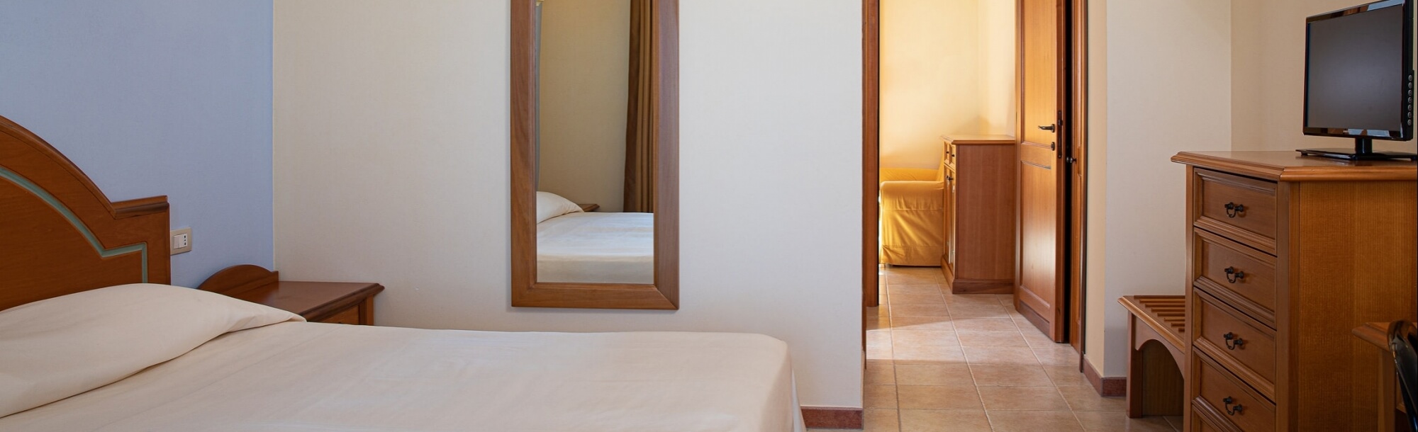 Zona notte bilocale residence