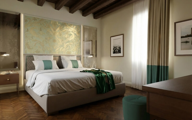 Camera d'hotel elegante con letto grande e decorazioni verdi.