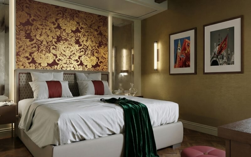 Camera d'hotel con letto grande, biancheria bianca e decorazioni eleganti.