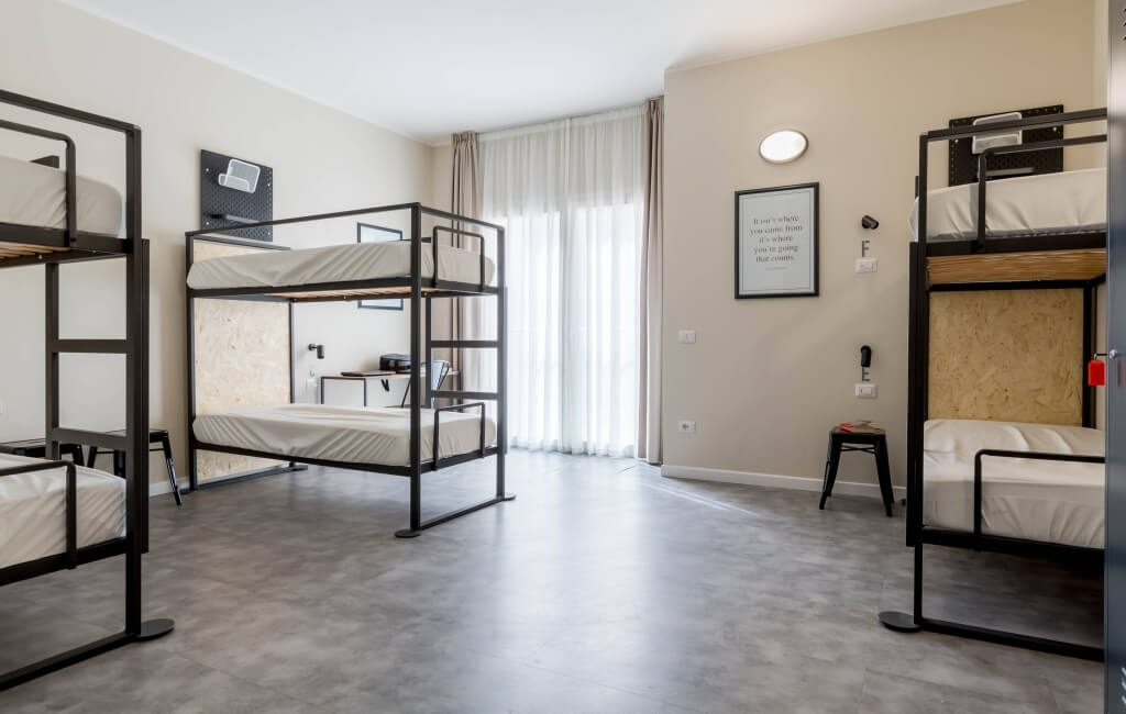 room with six single beds