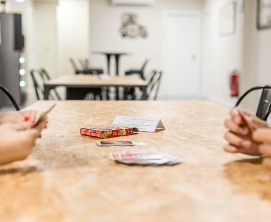two people playing cards