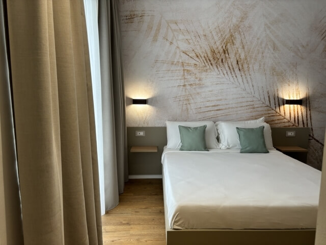 letto matrimoniale della camera deluxe