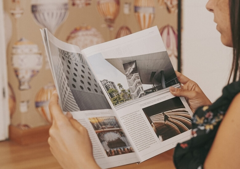 lady reading a magazine