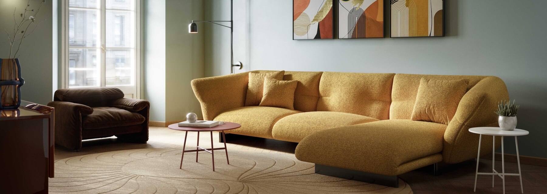 A cozy living room featuring a yellow couch, decorative tables, a reading nook, and abstract art on light blue walls.