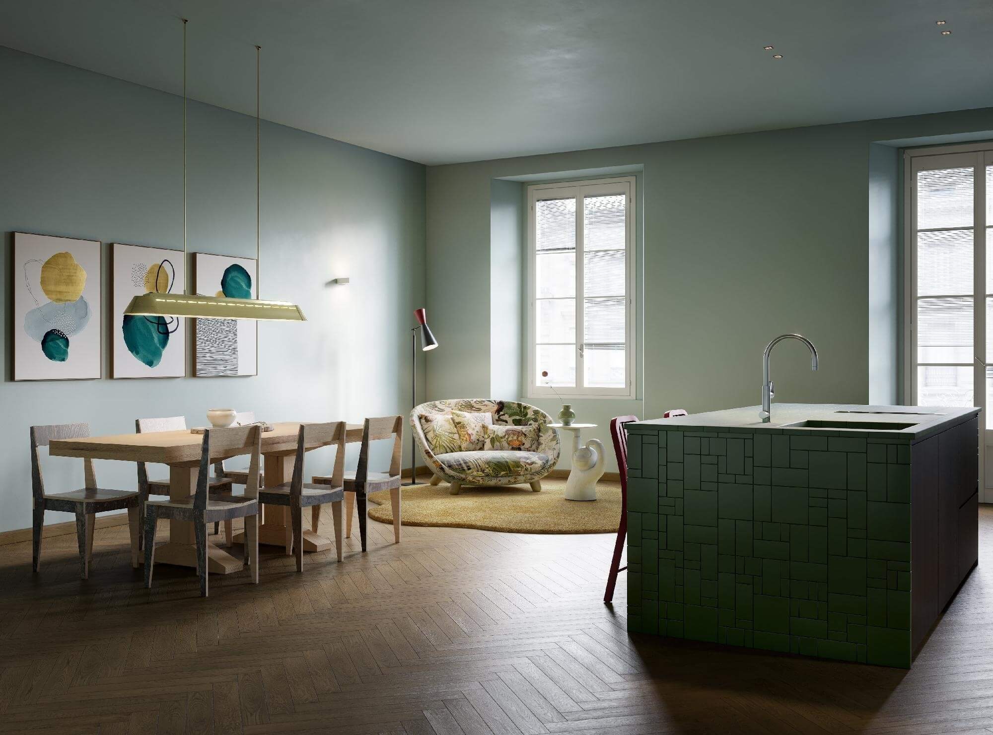 Modern open-plan kitchen and dining area with pale green walls, wooden table, dark green island, and natural light.