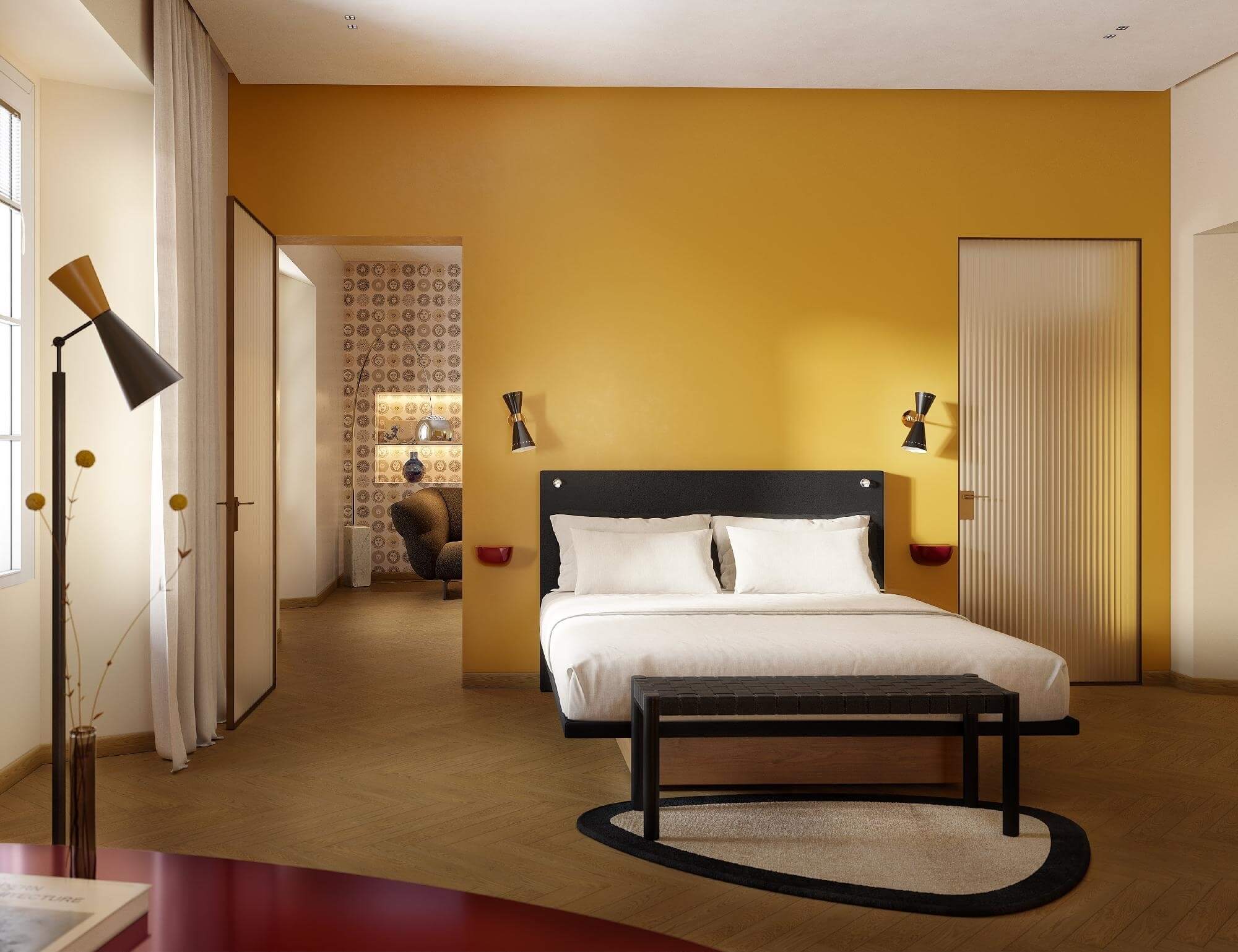 Modern bedroom with yellow walls, large bed, black and white rug, tall lamp, and open doorway to another room.